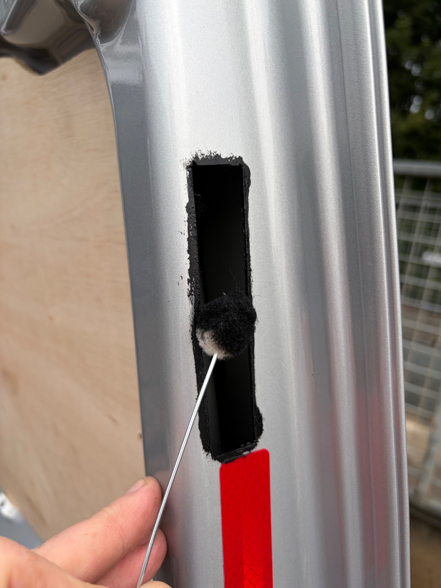 Cut lock aperture coated back over the bare metal before the hook lock is fitted in Beverley